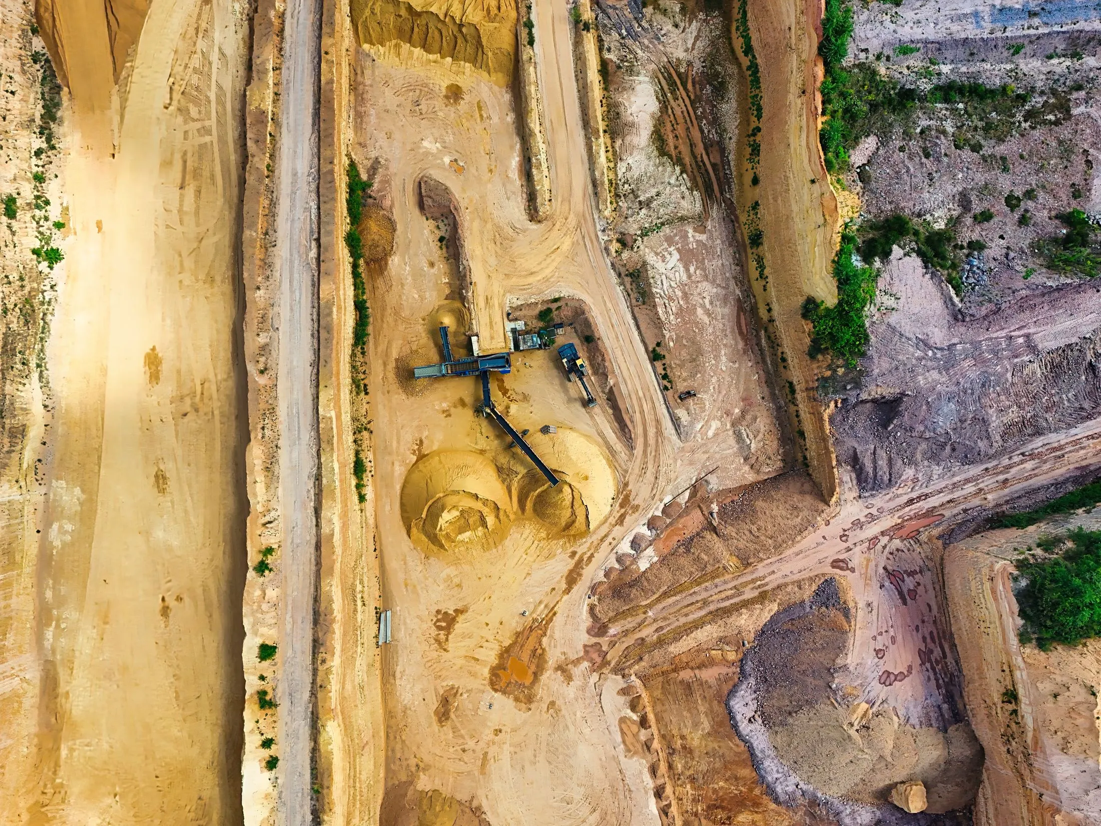 Aerial view of a gold-bearing open-pit operation
